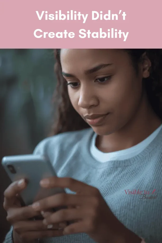 woman looking at cell phone